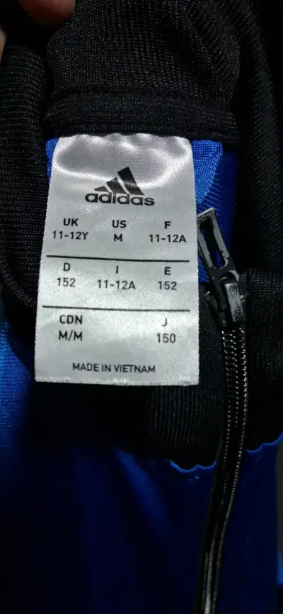 Chaqueta deportiva Adidas azul y negra para niño - miniatura 3
