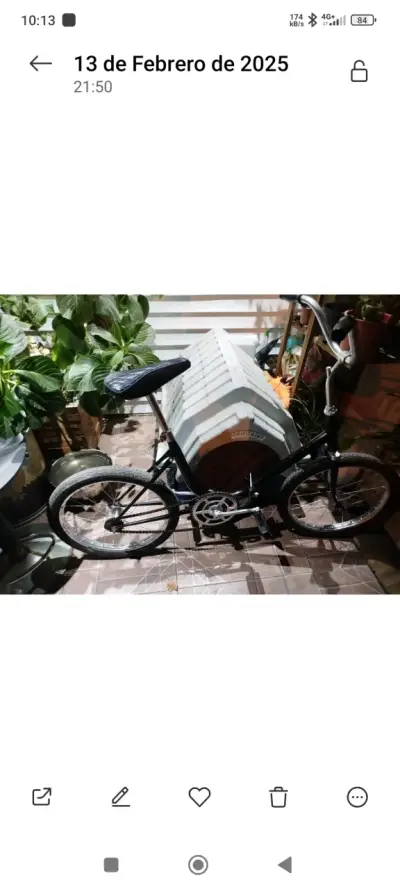 Bicicleta plegable urbana negra en buen estado - miniatura 1