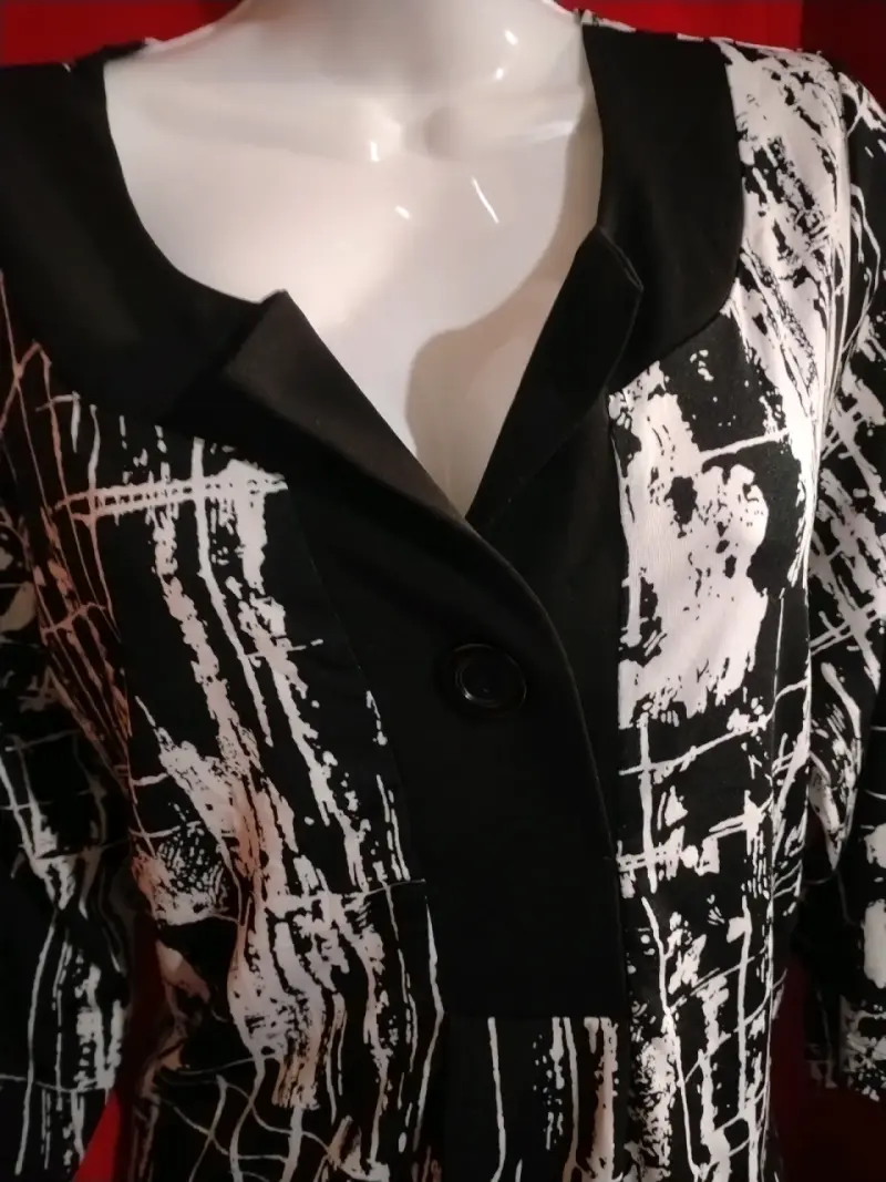 Blusa estampada en blanco y negro talla 1X - 2