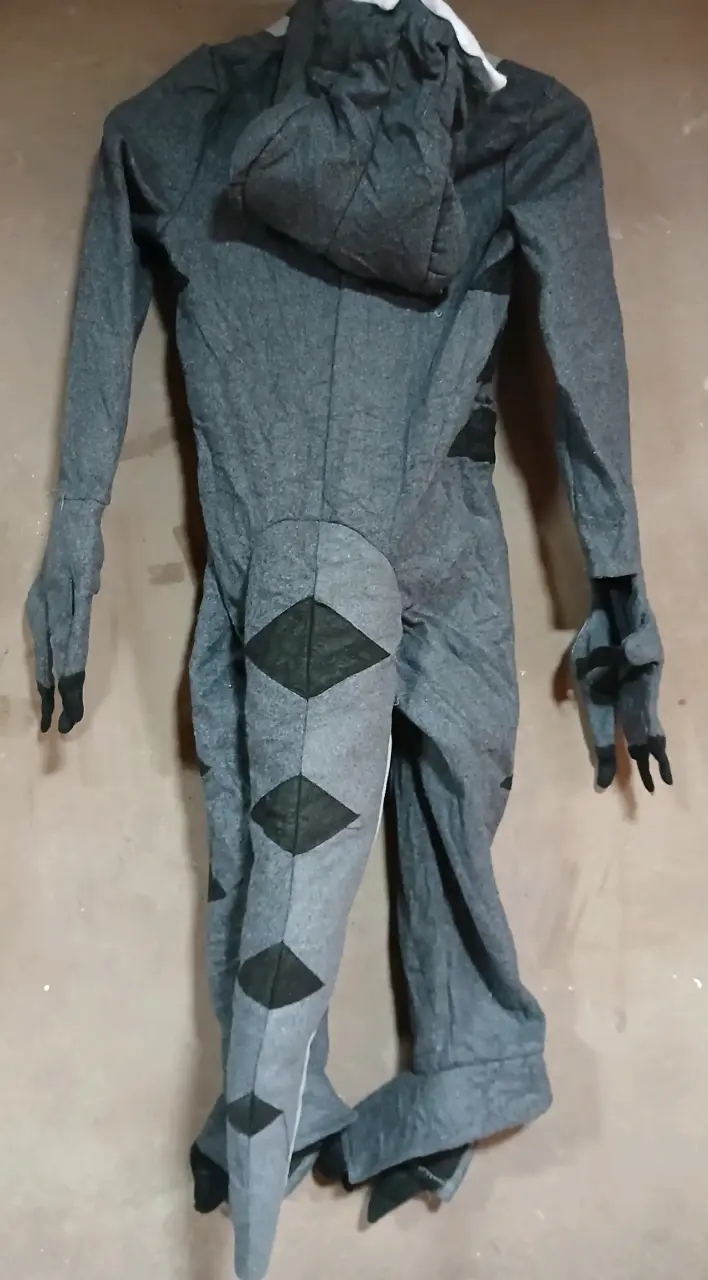 Disfraz de dinosaurio gris talla 8 a 10 años. - 2