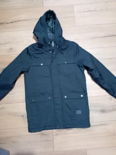 Chaqueta impermeable con capucha para niño - miniatura 1