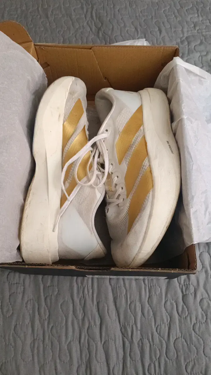 Zapatillas  Adizero Evo SL  doradas