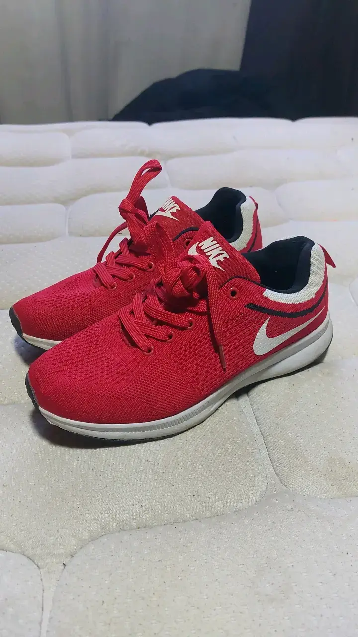 Zapatillas deportivas rojas Nike para hombre