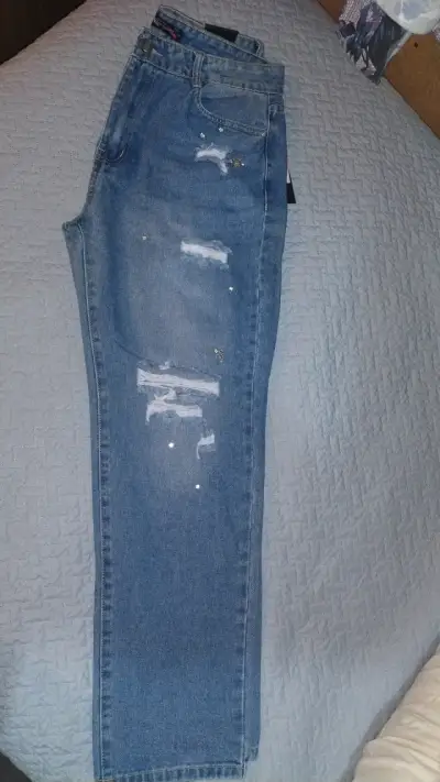 Jeans azules con decoración de brillos - miniatura 3