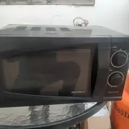 Microondas Somela negro con controles manuales