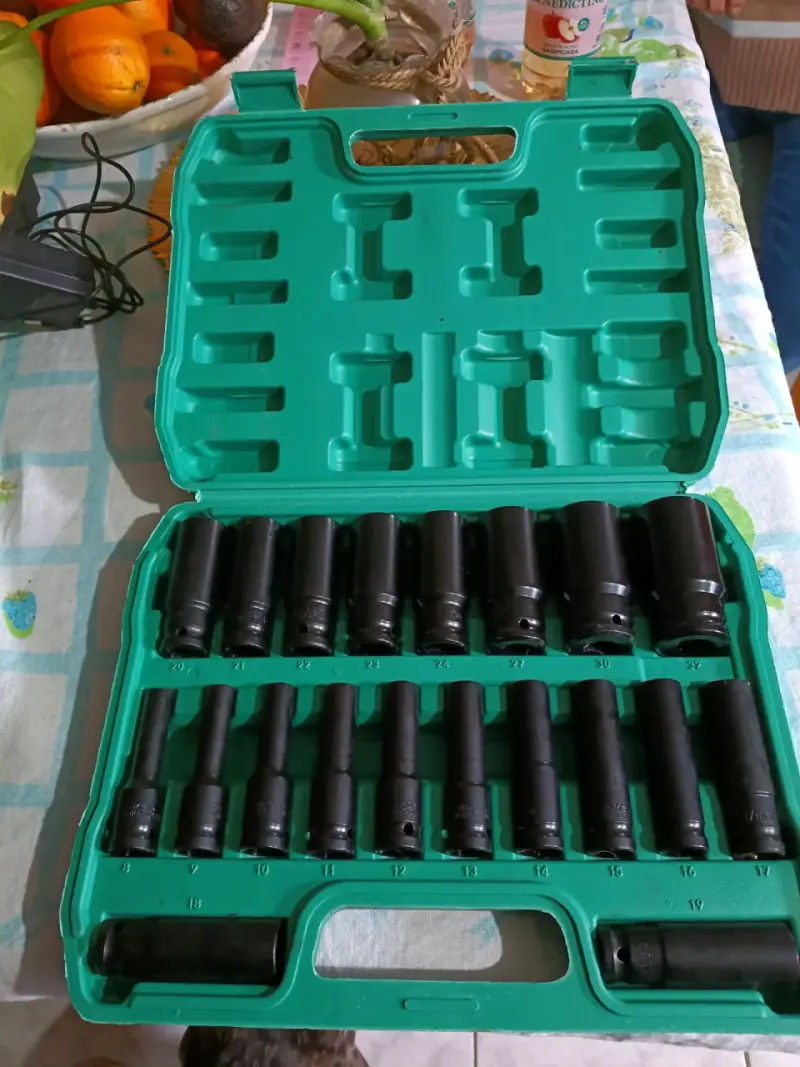 Juego de dados de impacto en estuche verde
