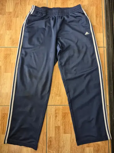 Pantalones deportivos azul marino Adidas con franjas - miniatura 1