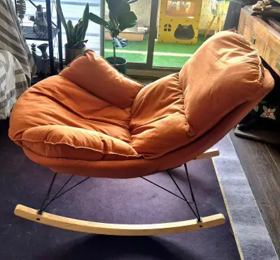 Sillón mecedora naranja seminuevo - miniatura 2