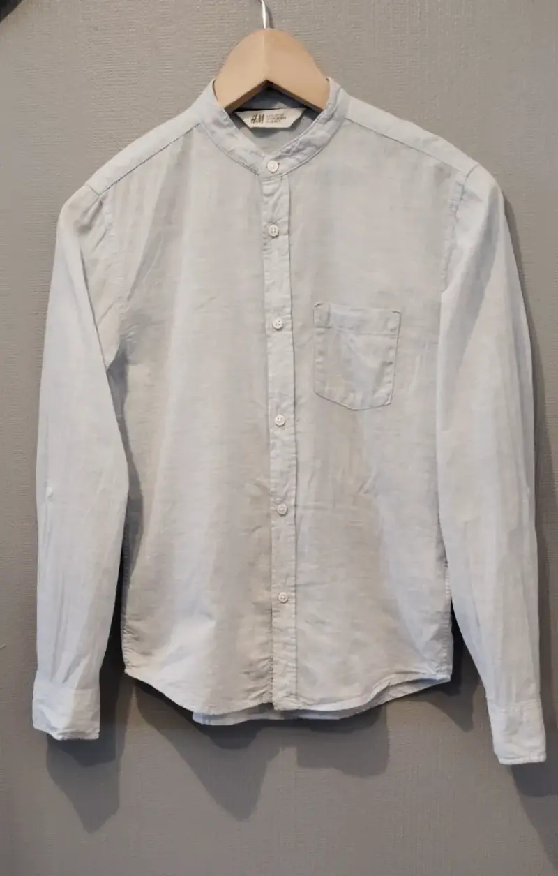 Camisa  celeste claro para niño H&M