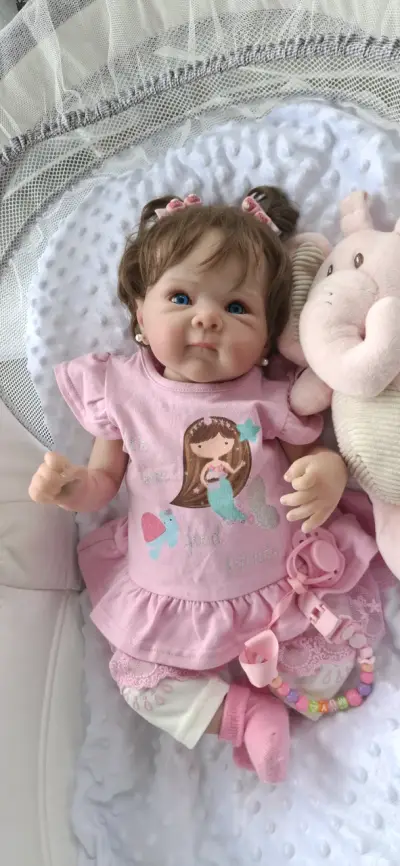 Muñeca Reborn Realista con Ropa Rosa - miniatura 1