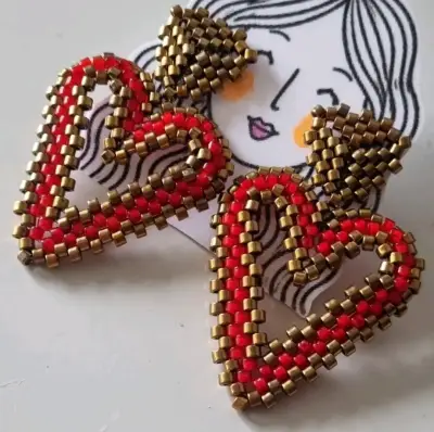 Aros tejidos a mano en forma de corazón - miniatura 1