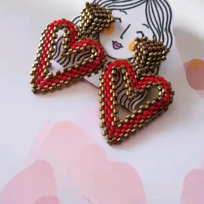 Aros tejidos a mano en forma de corazón - miniatura 3