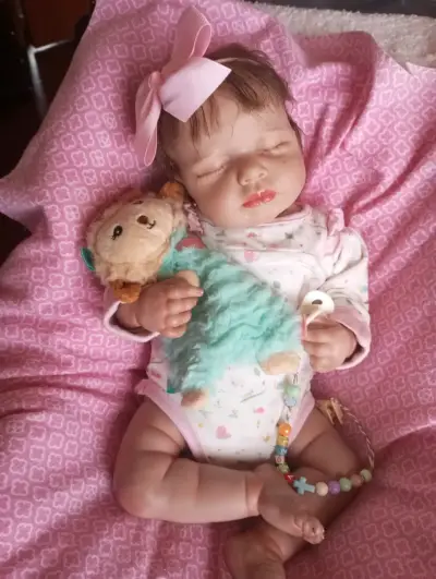 Muñeca reborn bebé con chupete - miniatura 1