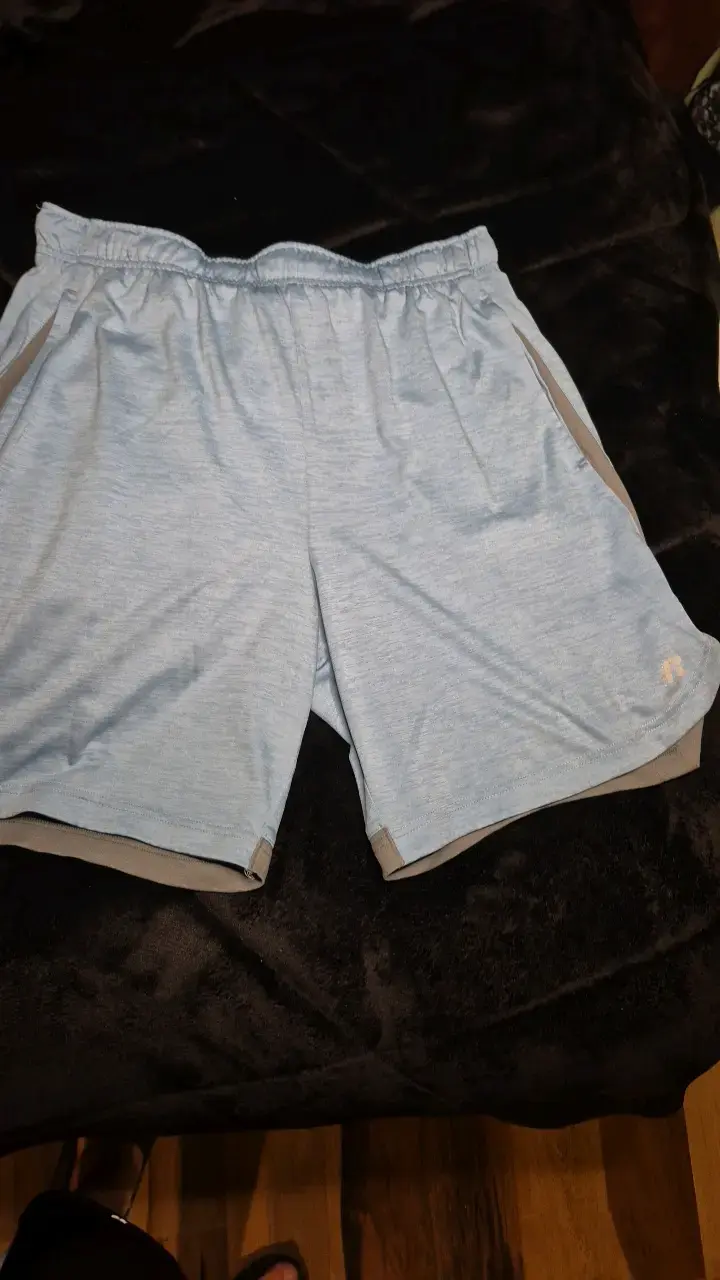 Shorts deportivos azules Russell para hombre - 1