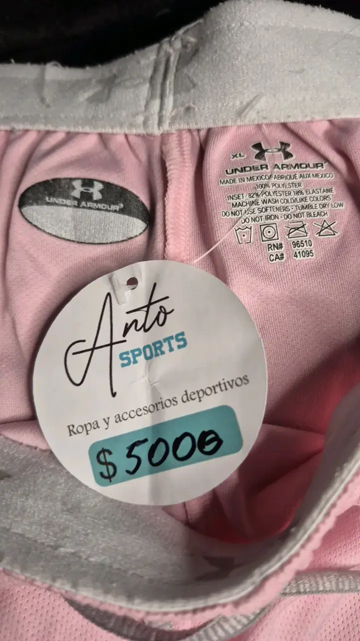 Shorts deportivos rosados Under Armour - 3