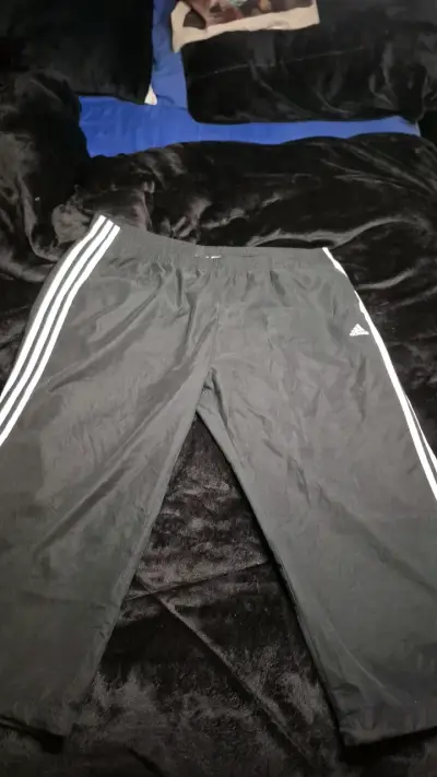 Pantalones deportivos negros Adidas con franjas - miniatura 1