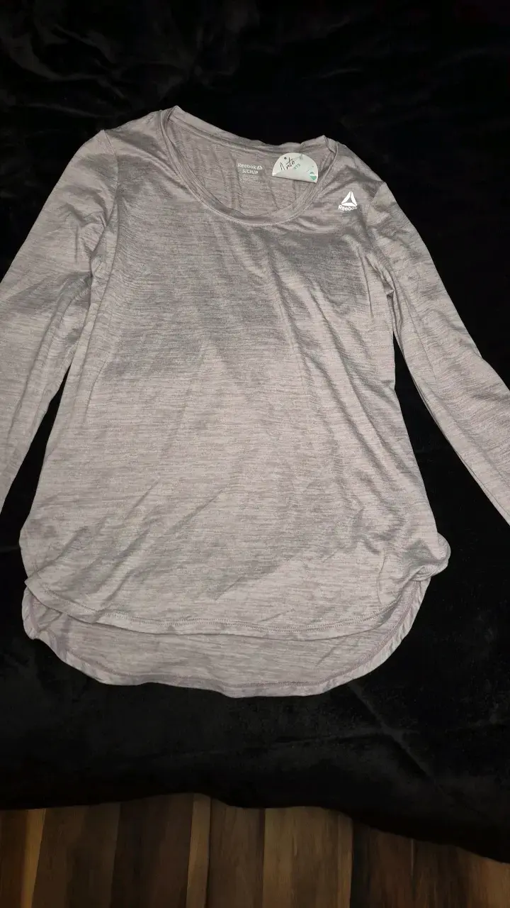 Polera deportiva Reebok gris para mujer - 1