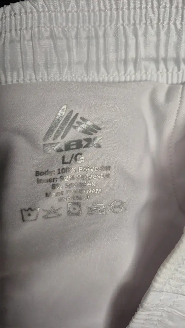 Shorts deportivos blancos RBX para hombre y mujer - 2