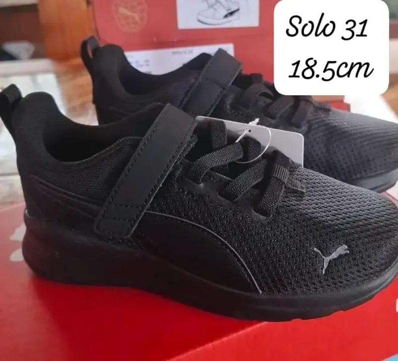 Zapatillas negras para niños Puma talla 31