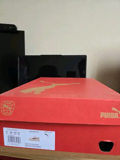 Zapatillas Puma beige con diseño animal print - miniatura 2