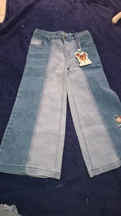 Pantalones de mezclilla para niña con diseño bicolor - miniatura 1