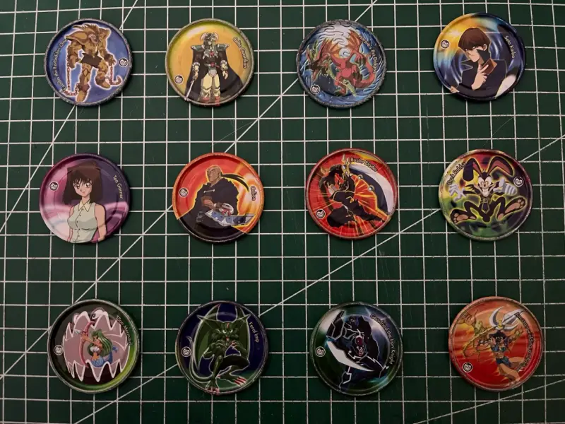 Colección de tazos metálicos Yu-Gi-Oh 12/60 - 1