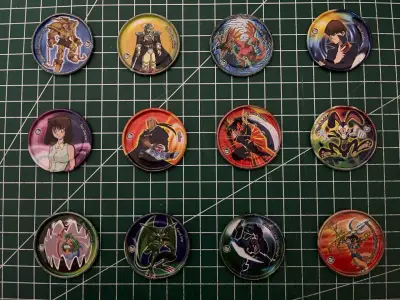 Colección de tazos metálicos Yu-Gi-Oh 12/60 - miniatura 1