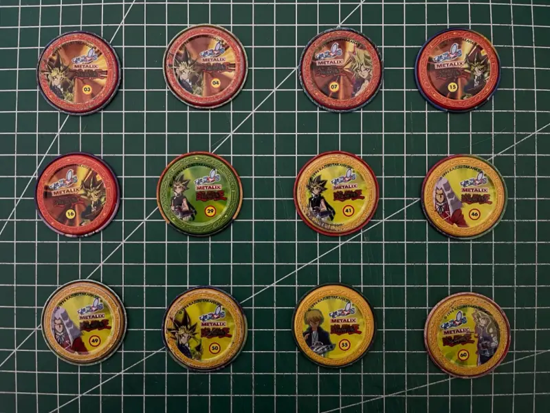 Colección de tazos metálicos Yu-Gi-Oh 12/60 - 2