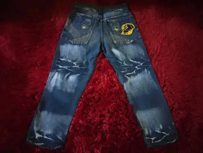 Jeans de mezclilla con diseño desgastado para niño - miniatura 1