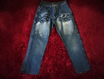 Jeans de mezclilla con diseño desgastado para niño - miniatura 2