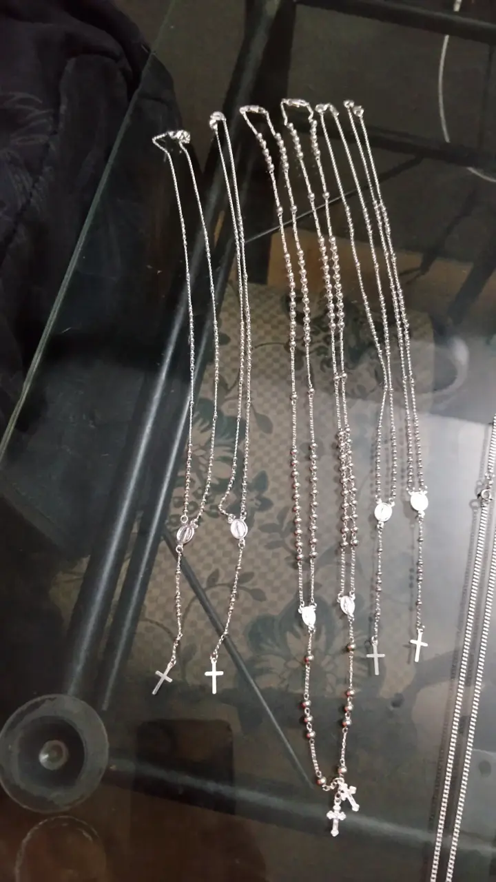 Collares de rosario en plata con cruces