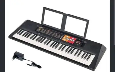 Teclado electrónico con adaptador incluido - miniatura 1