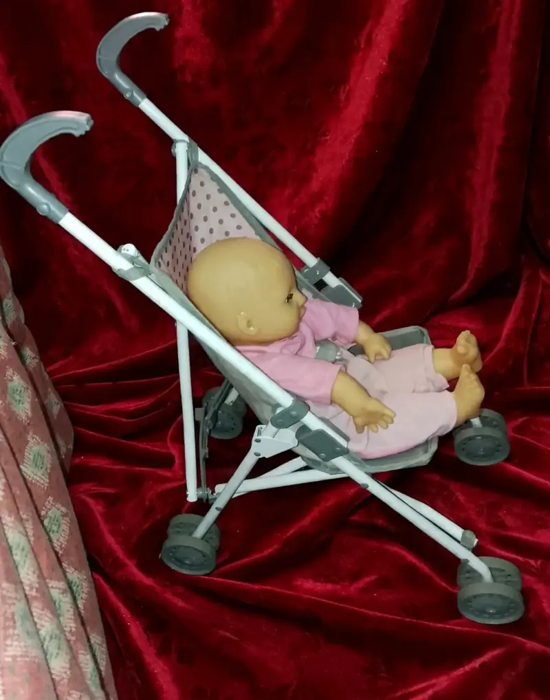 Coche de juguete para muñeca plegable