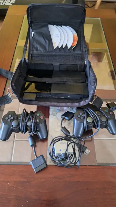 Consola PlayStation 2 con accesorios y juegos - miniatura 1