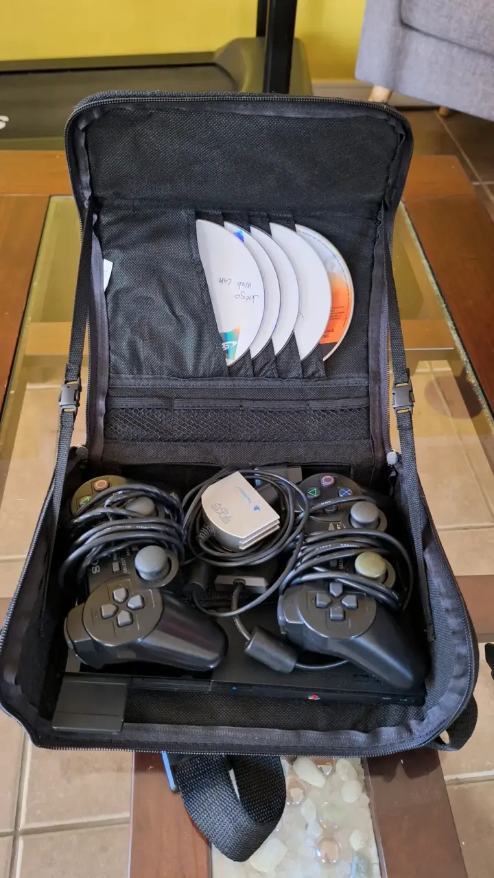 Consola PlayStation 2 con accesorios y juegos - 2