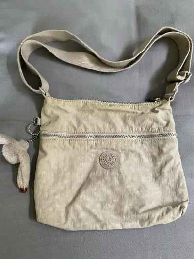 Bandolera beige con colgante Kipling - miniatura 1
