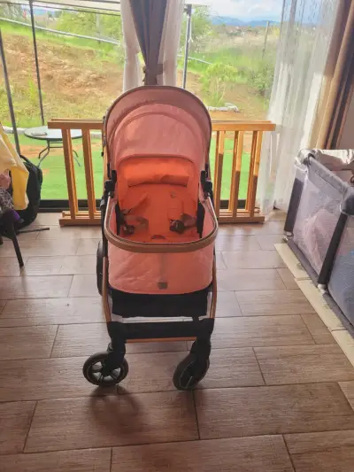 Coche de bebé rosa con moisés desmontable - miniatura 6