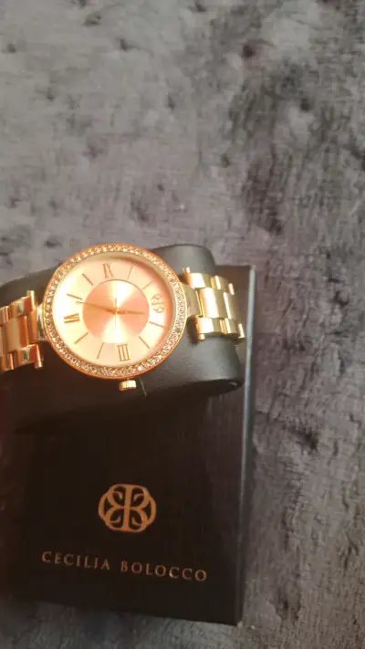 Reloj dorado elegante Cecilia Bolocco - miniatura 1