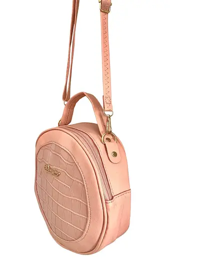 Cartera bandolera y de mano redonda rosada - miniatura 3