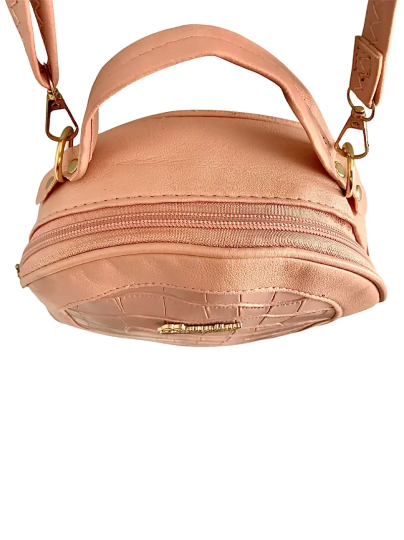 Cartera bandolera y de mano redonda rosada - 4