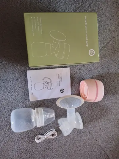 Extractor de Leche Eléctrico Portátil Compacto - miniatura 1