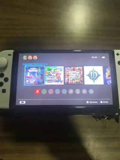 Nintendo Switch Oled con accesorios - miniatura 1