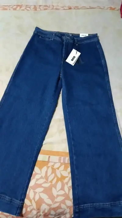 Jeans acampanados de mezclilla azul  para mujer - miniatura 3