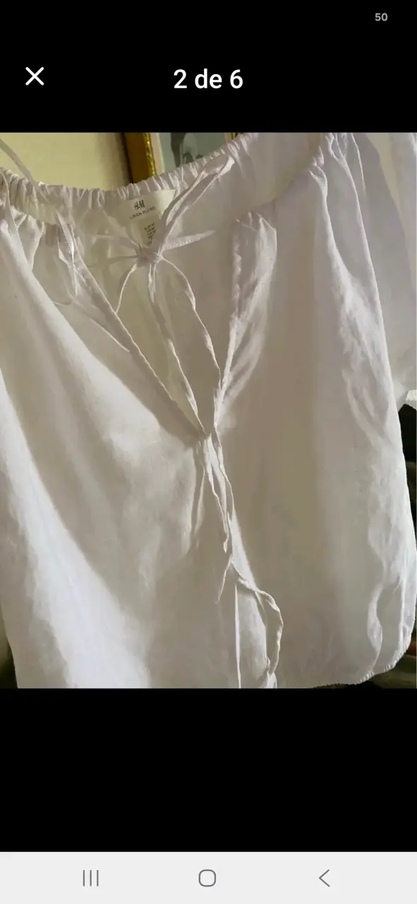 Blusa blanca de lino con mangas abullonadas - 2