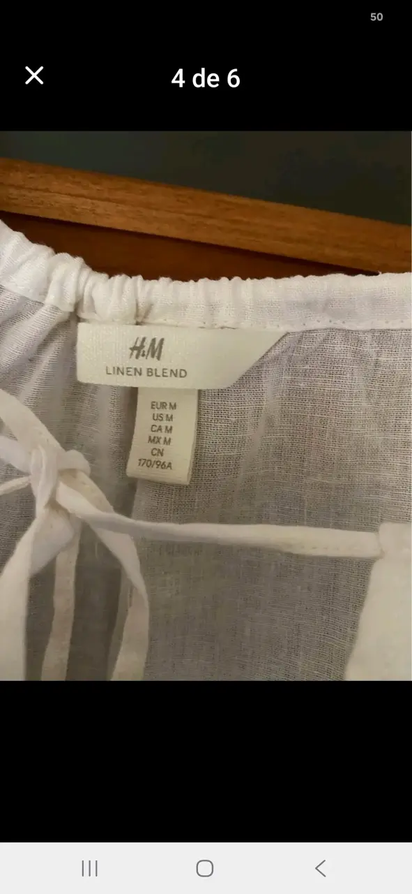 Blusa blanca de lino con mangas abullonadas - 6