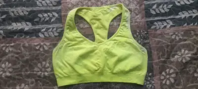 Top deportivo amarillo para mujer - miniatura 1