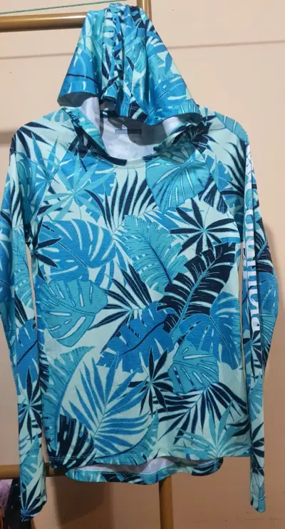 Polera Columbia con capucha estampado tropical - miniatura 1
