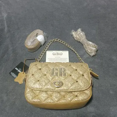 Cartera dorada con cadena Gino Rodinis - miniatura 1