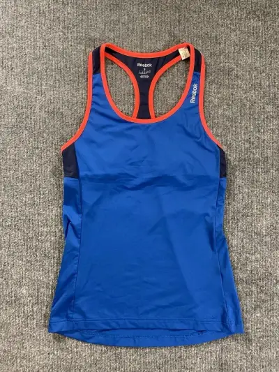 Polera deportiva mujer Reebok azul con detalles rojos - miniatura 1