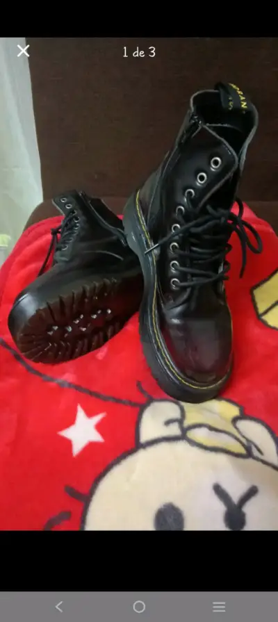 Botas negras de cuero con suela resistente - miniatura 1
